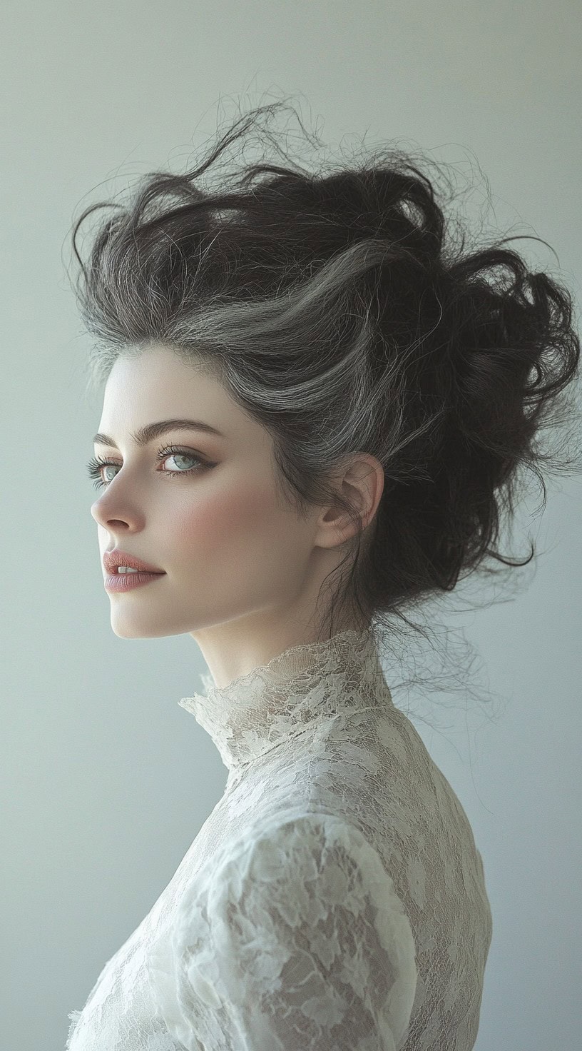 This photo shows a woman with a voluminous updo featuring prominent white streaks.