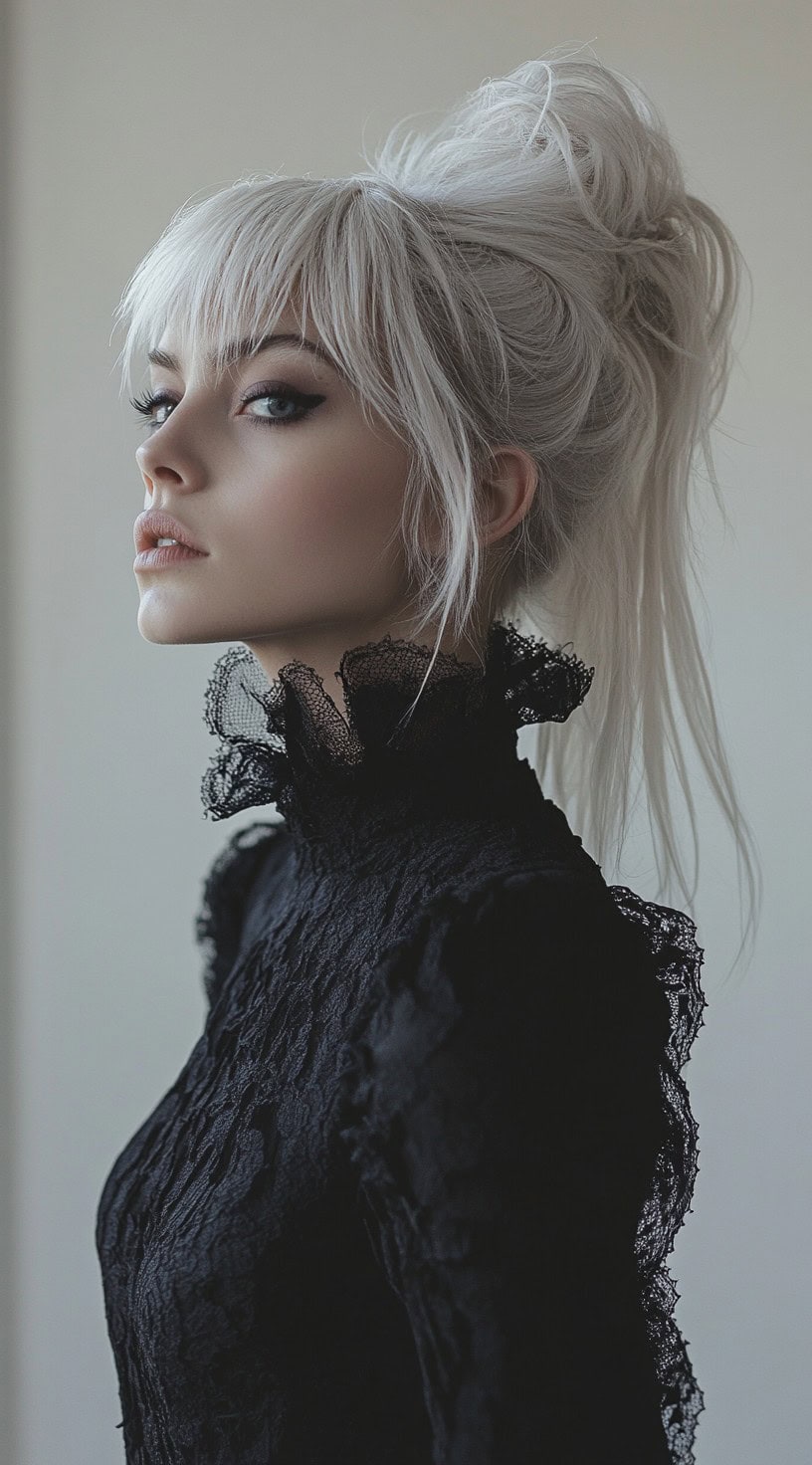 This photo shows a woman with a platinum blonde updo, loose locks, and long bangs.