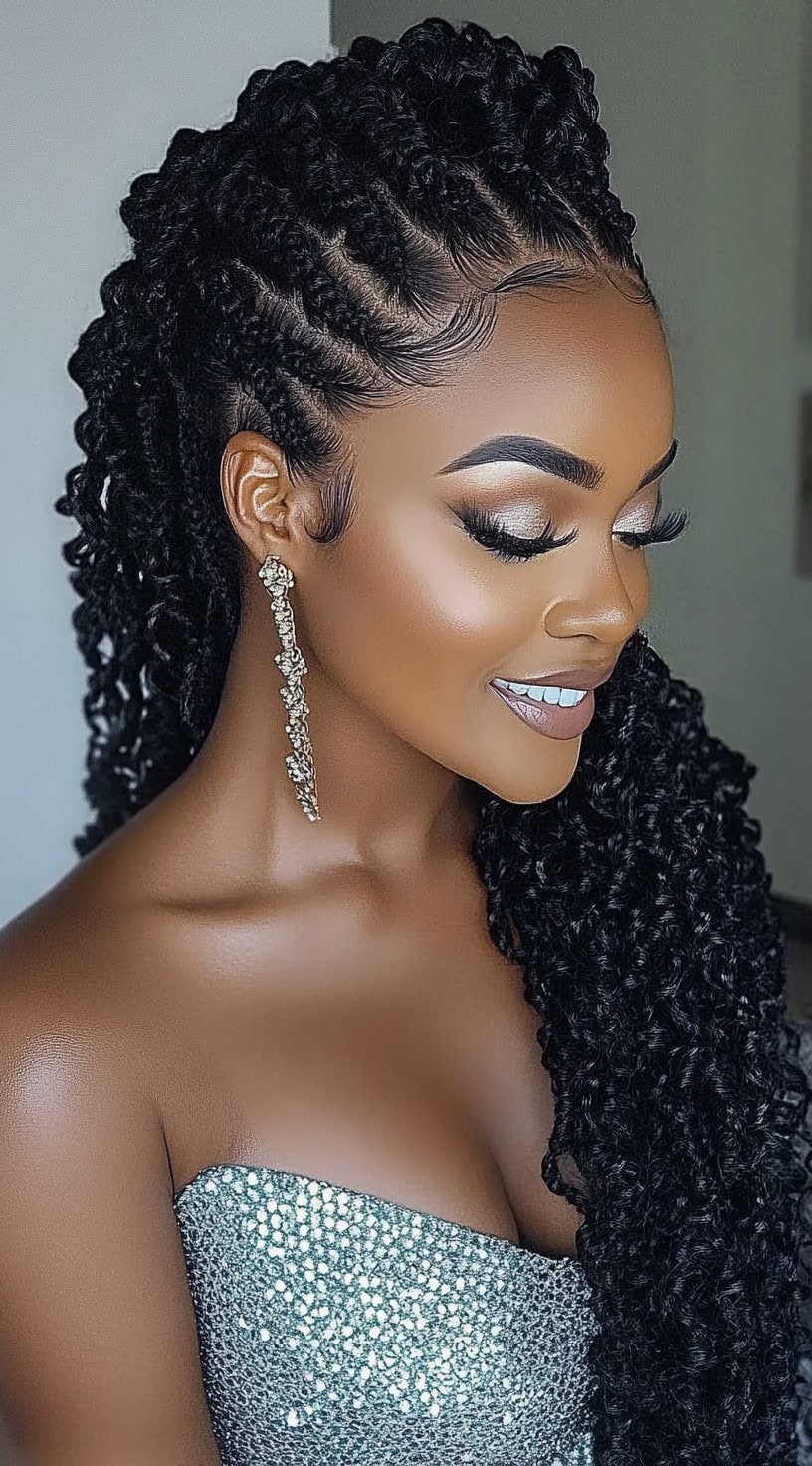 A woman with half-up twisted locs, styled into an elegant crown, with the remaining length cascading into defined, voluminous curls.