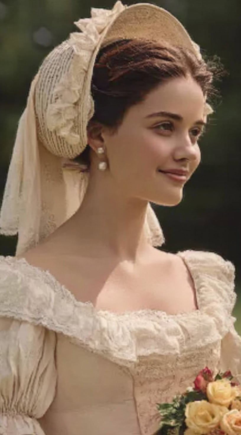 Young woman in cream Victorian dress and bonnet with smooth hair pulled back into a low bun.